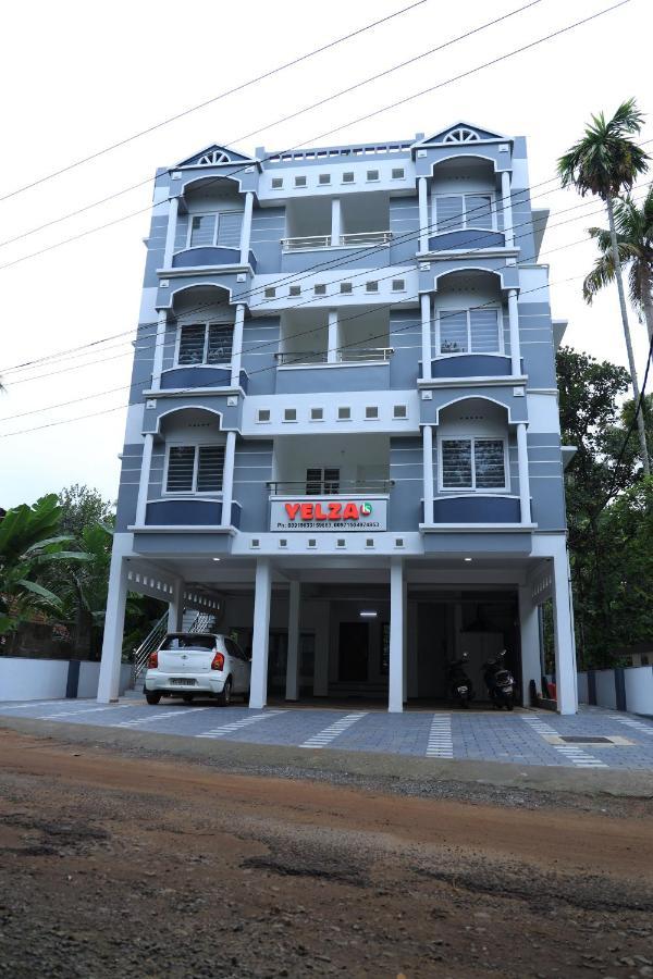 Yelza Hotel And Residence Alwaye Екстериор снимка