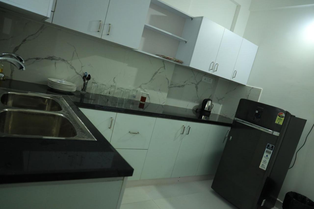 Yelza Hotel And Residence Alwaye Екстериор снимка