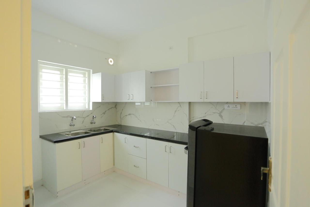 Yelza Hotel And Residence Alwaye Екстериор снимка