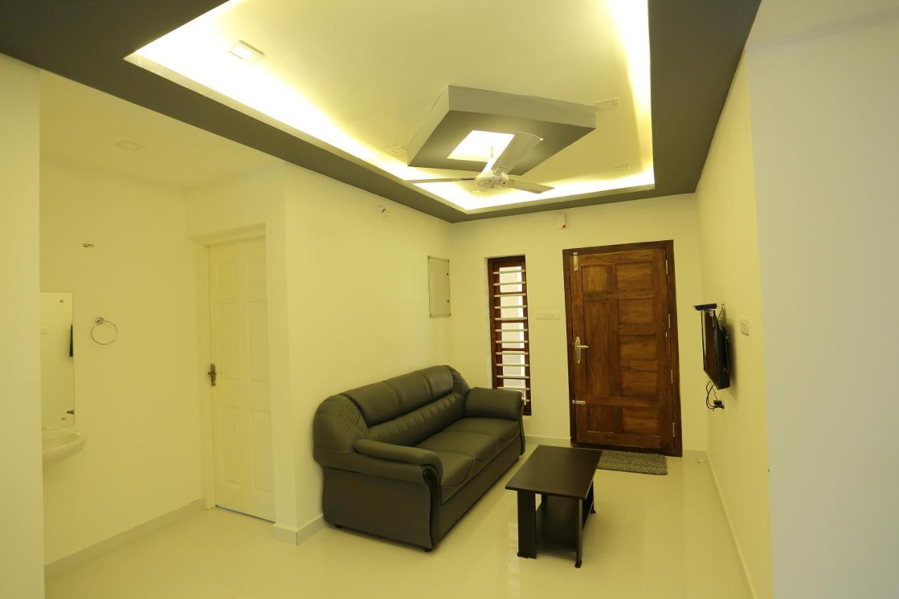 Yelza Hotel And Residence Alwaye Екстериор снимка