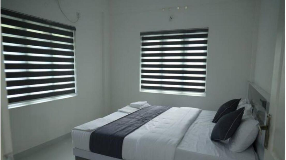 Yelza Hotel And Residence Alwaye Екстериор снимка